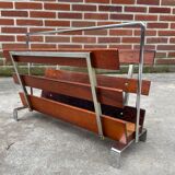 Vintage magazine rack from  rosewood and chrome design