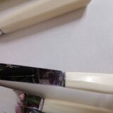 Set of 12 Bakelite table and dessert knives