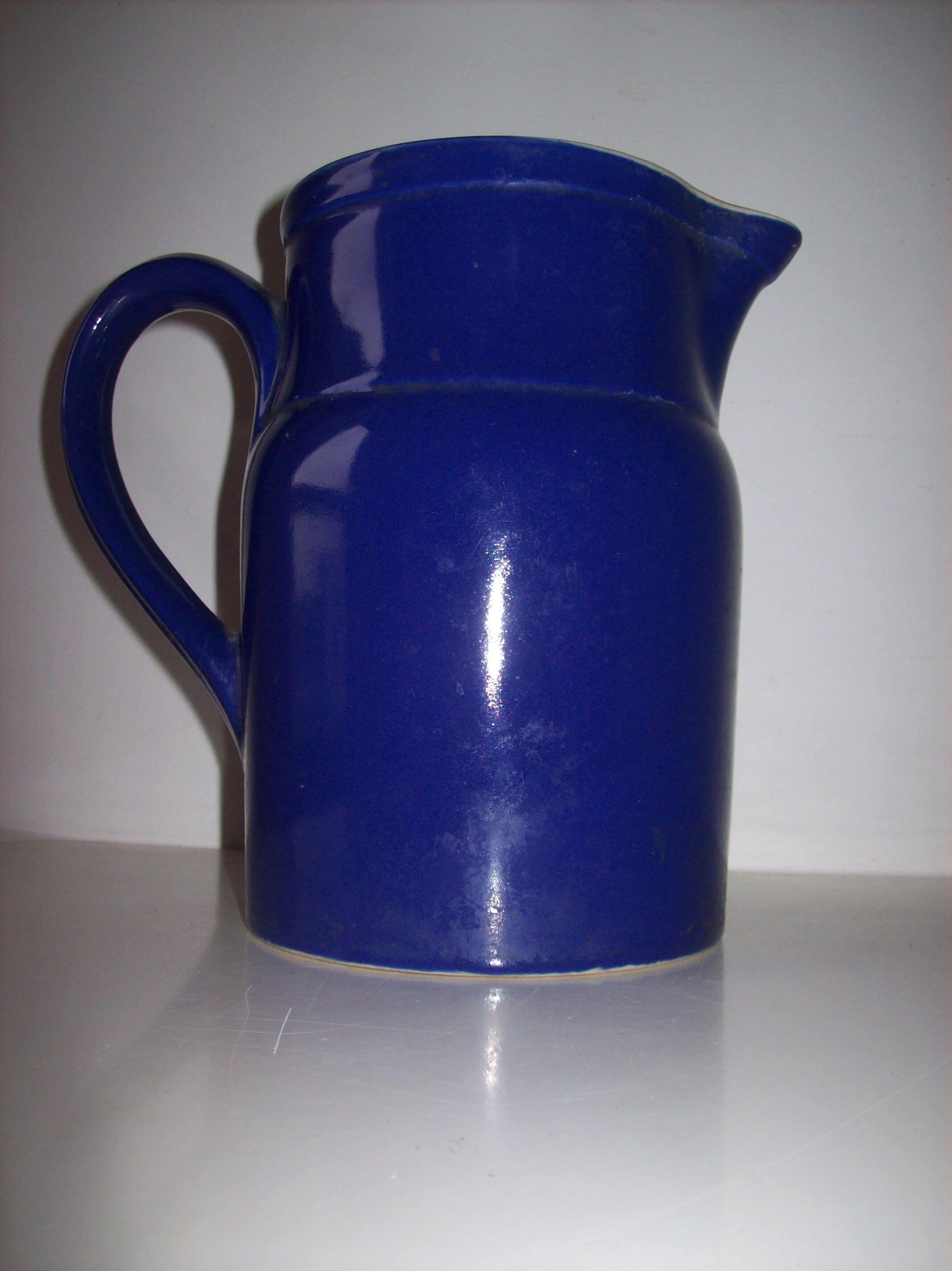 Old blue ceramic Digoin pitcher