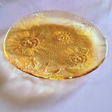 Glass plate decorated with suns, 1980.