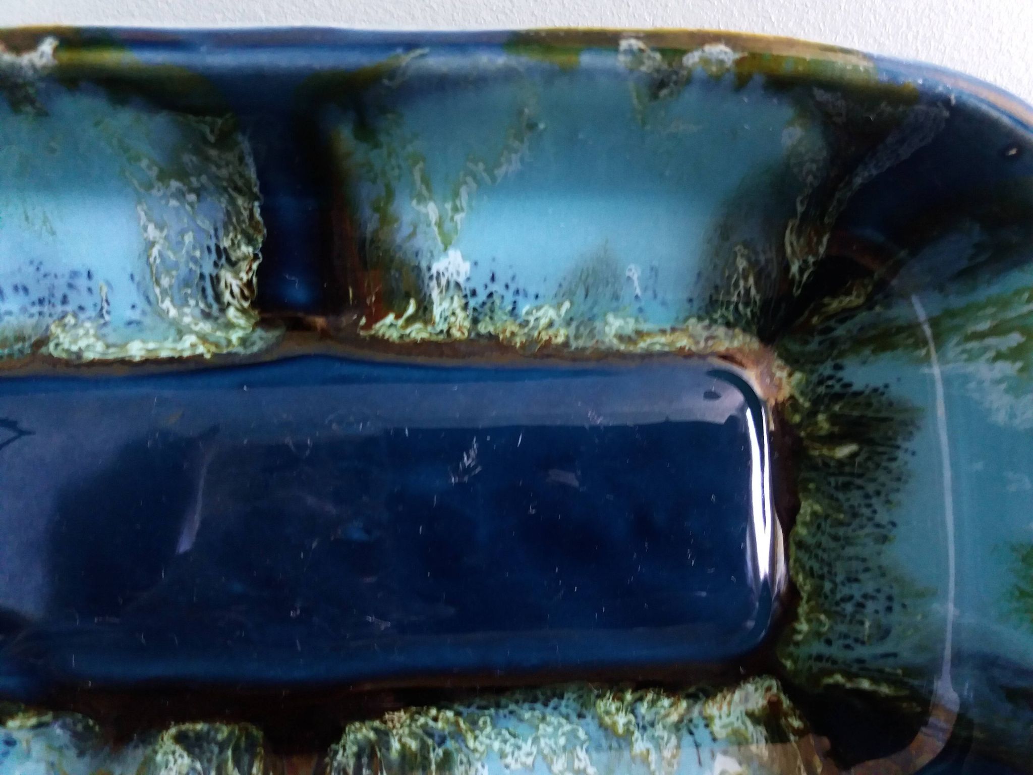 Vallauris stamped pocket emptier in flamed stoneware