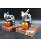Antique Art Deco bookends in silver-plated metal, bakelite, and marble, signed H. M.