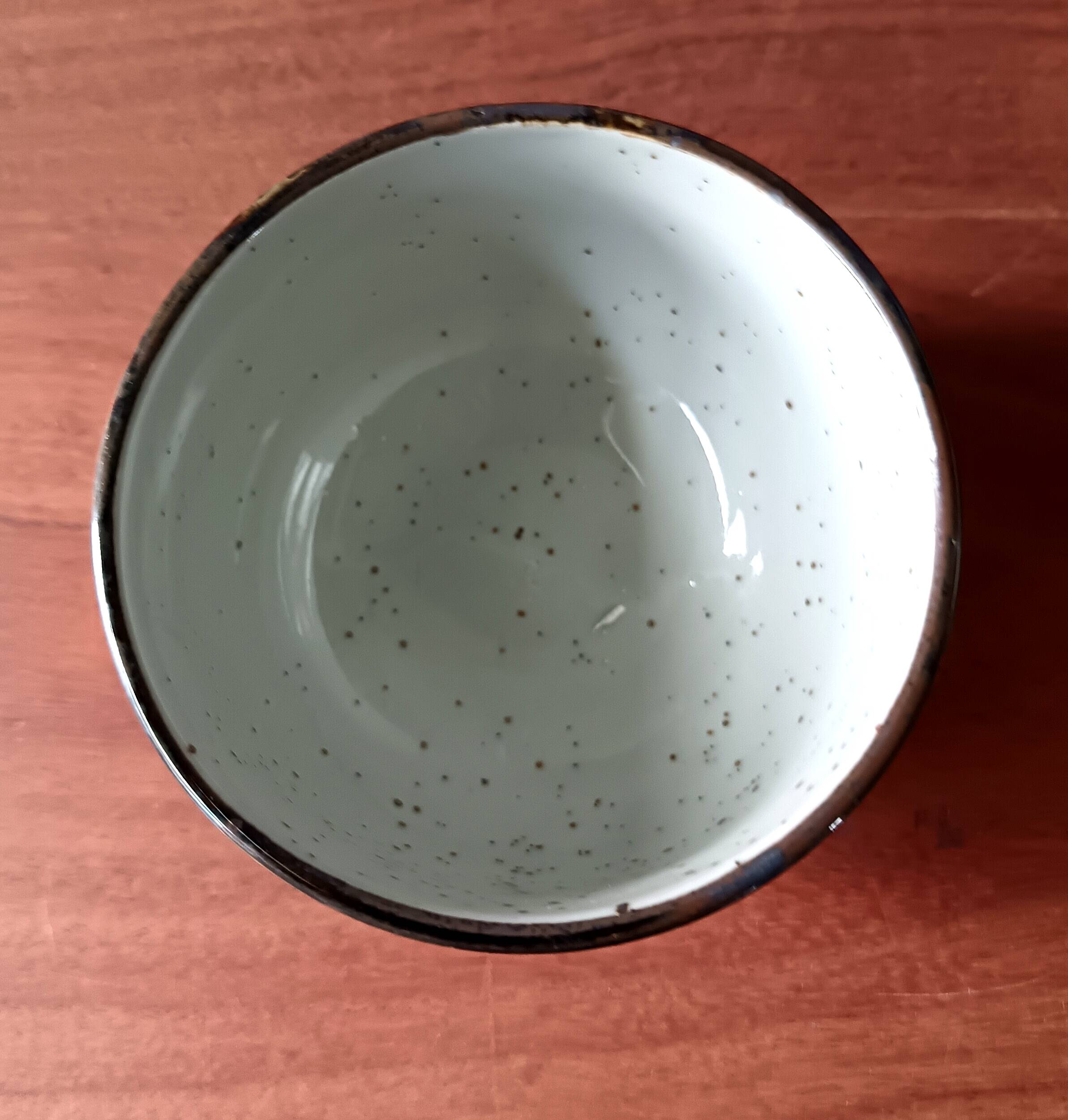 Asian ceramic and rattan tea set with plant geisha motifs