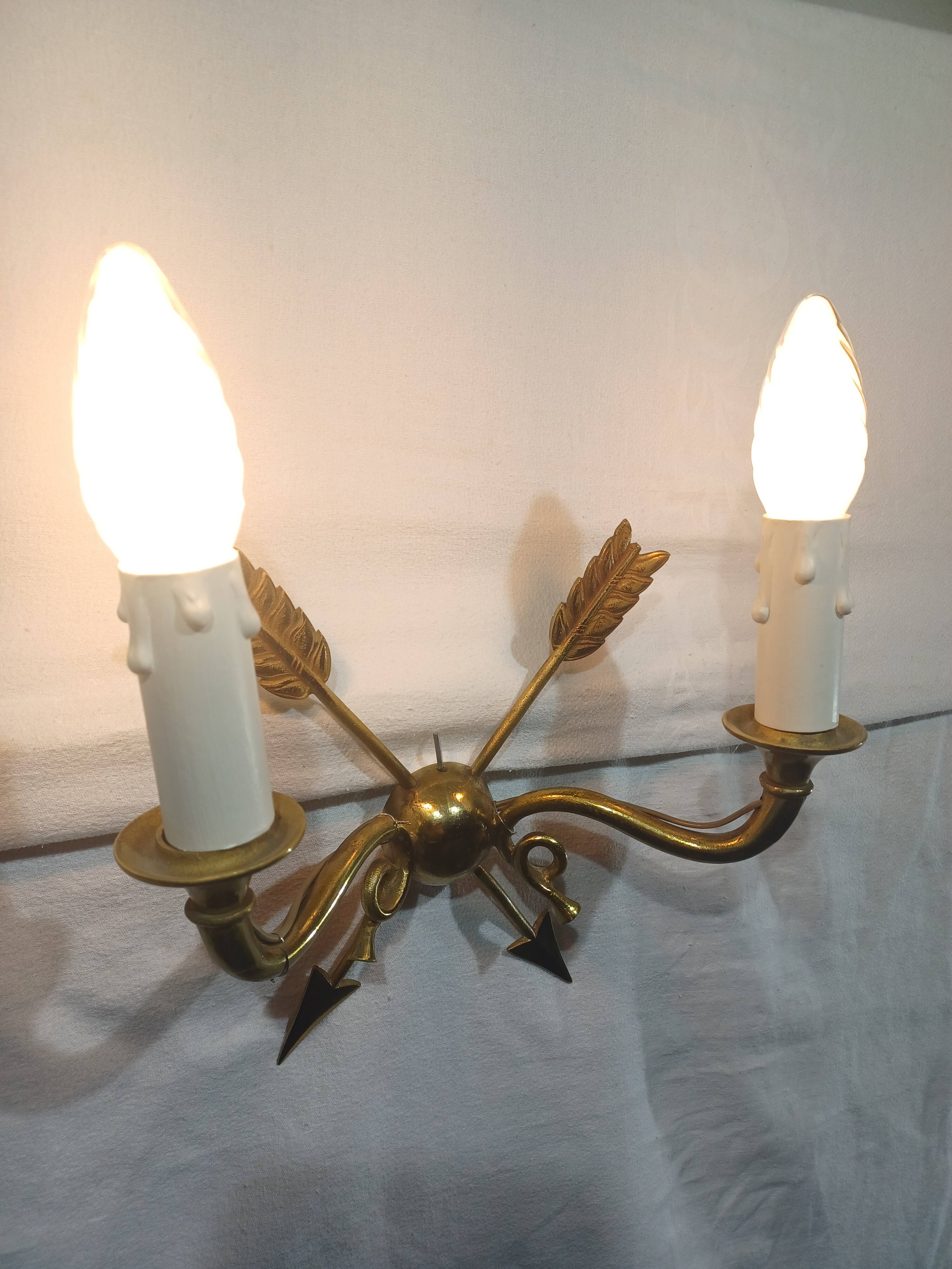 Empire style arrow wall light