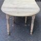 Round extendable dining table with flaps, stripped in raw oak, with 3 extensions.