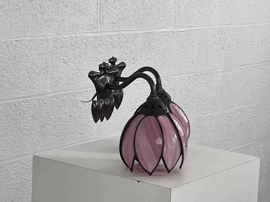 Pair of Tiffany style iron and glass leg wall lights