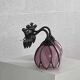 Pair of Tiffany style iron and glass leg wall lights