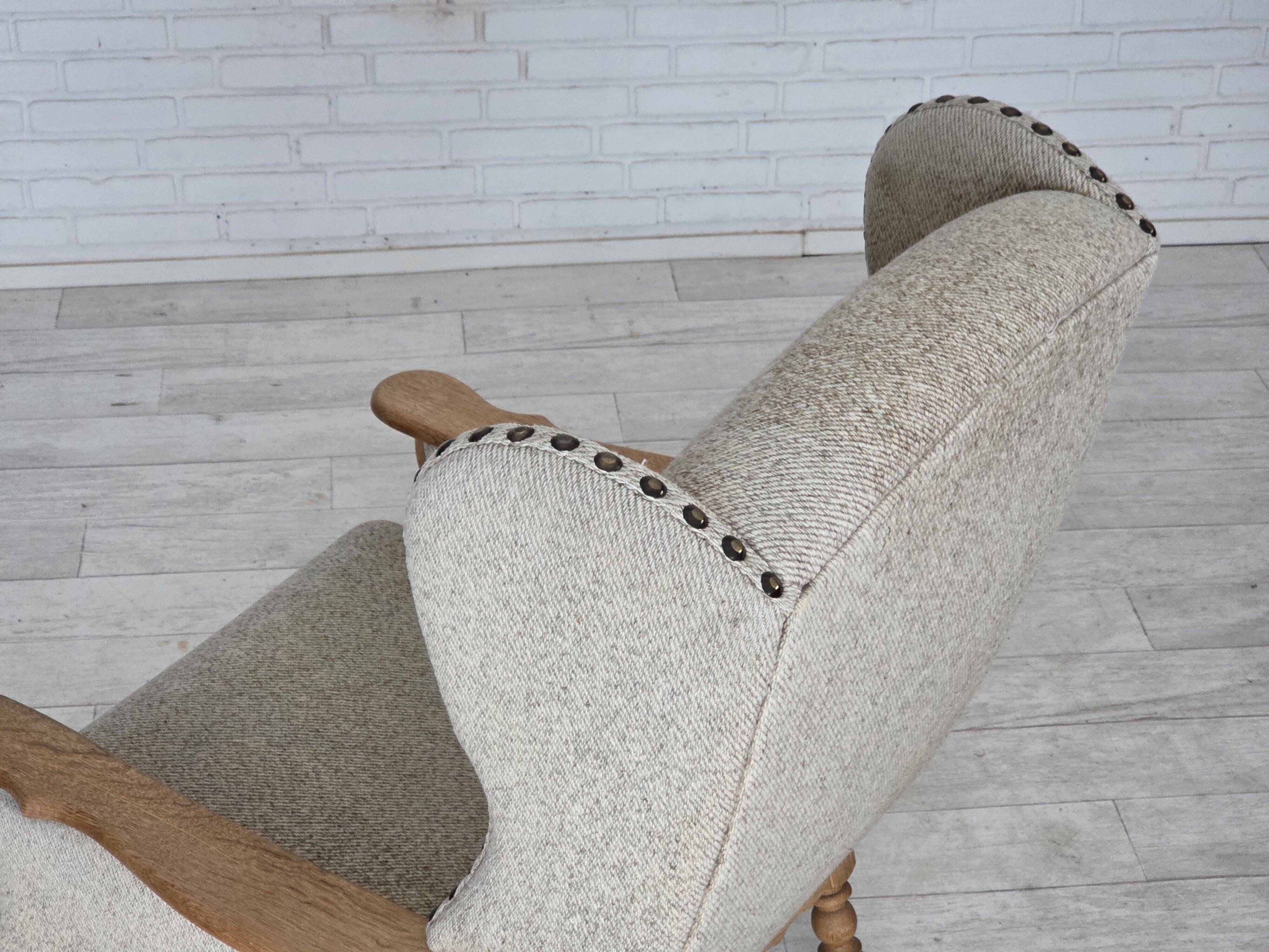 1970s, Danish highback armchair, furniture wool, solid oak wood.