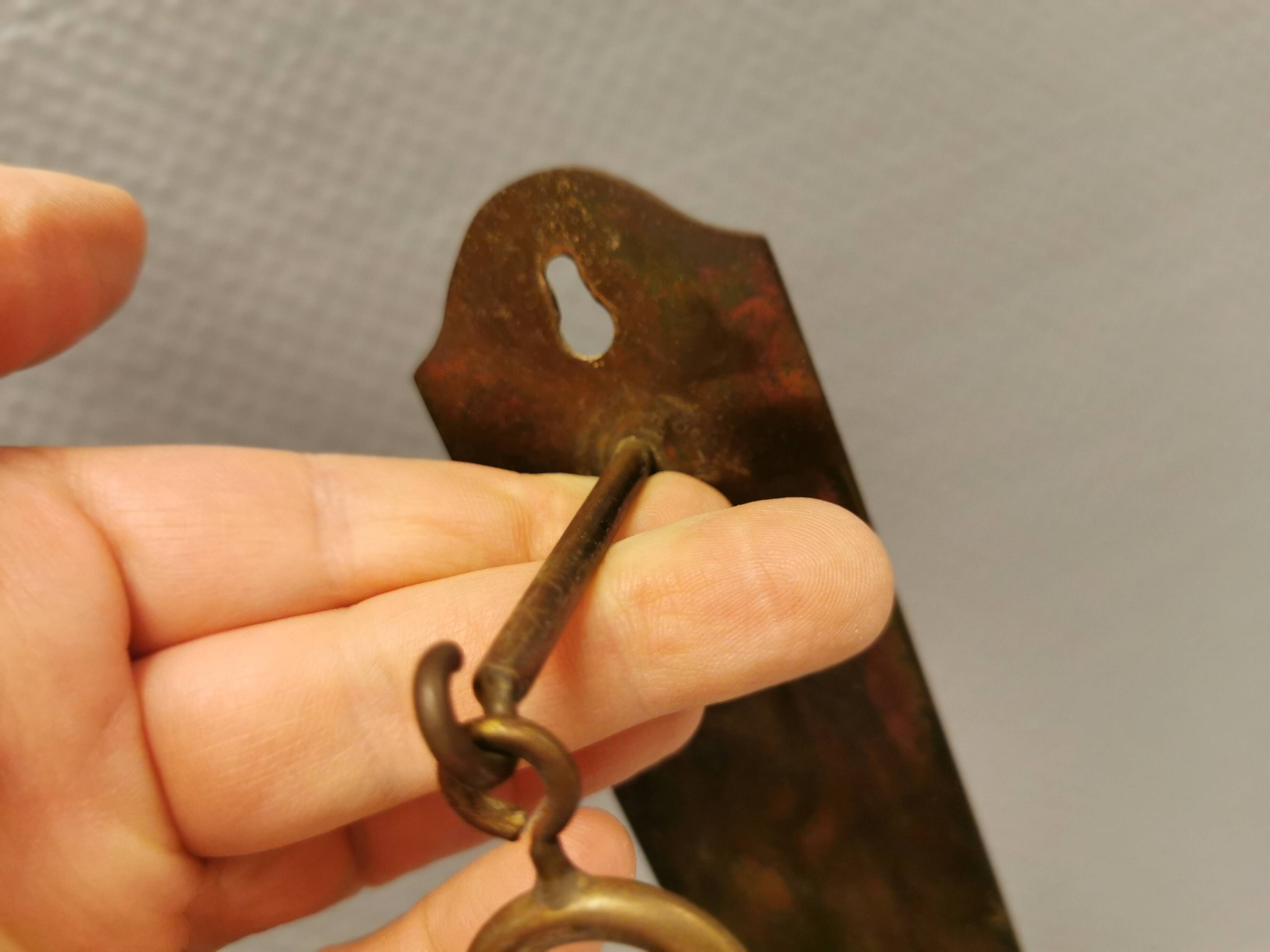 Old Wall hung brass candle holder.