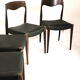Suite of 4 chairs in teak and skai