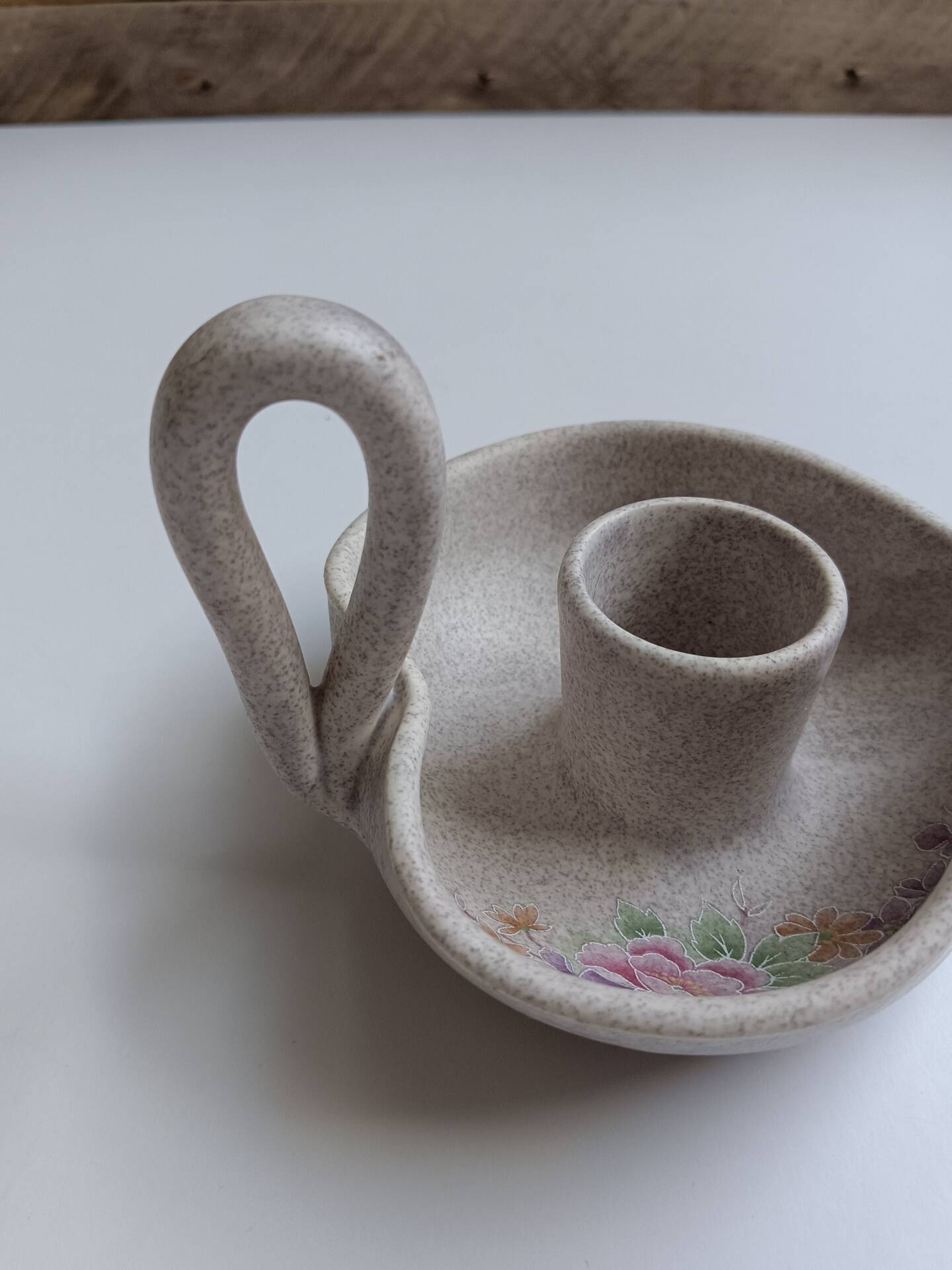 Vallauris grey candle holder with pink flowers, signed.