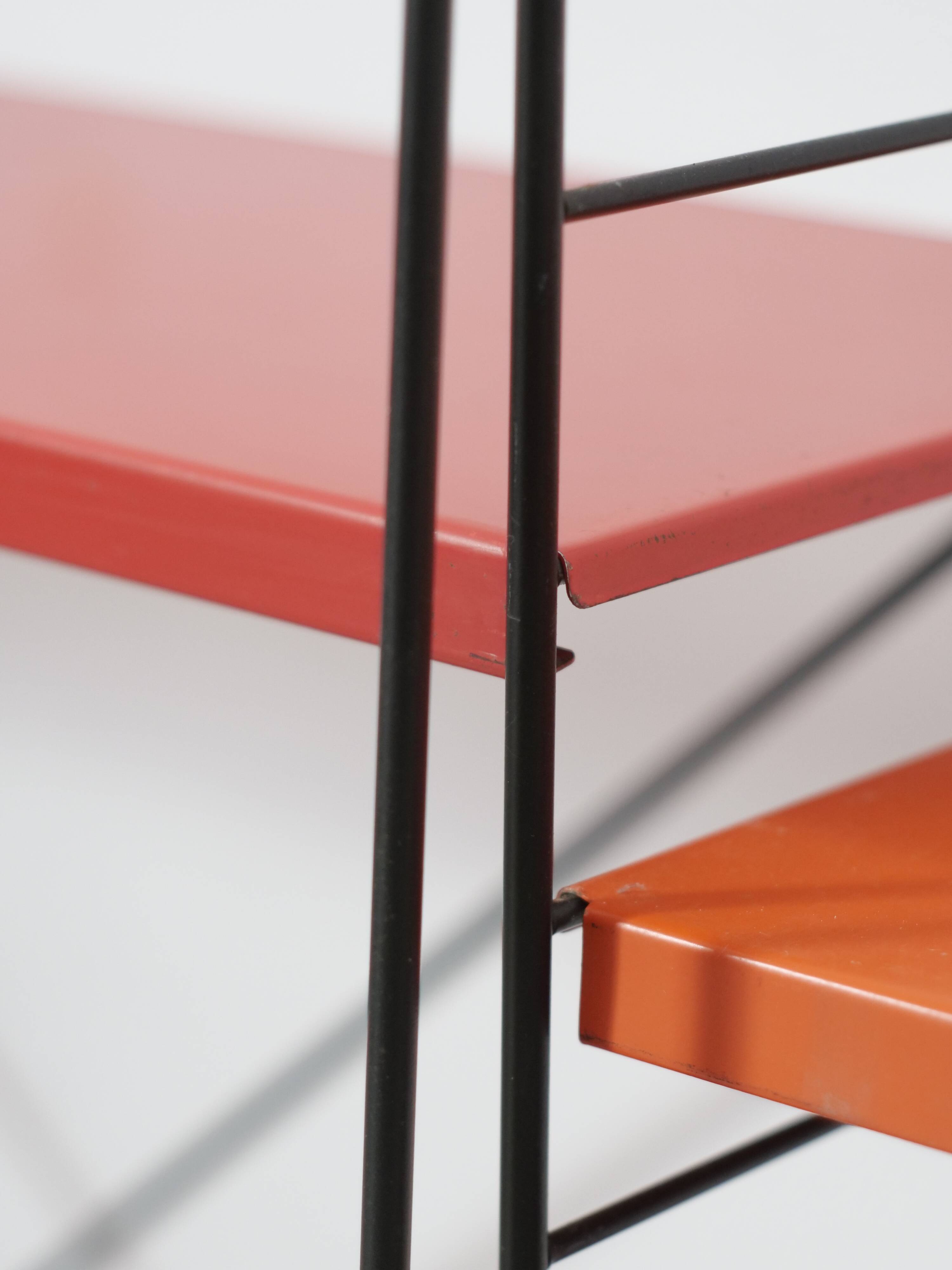 Tomado shelf in coloured metal floor shelves from 1958.