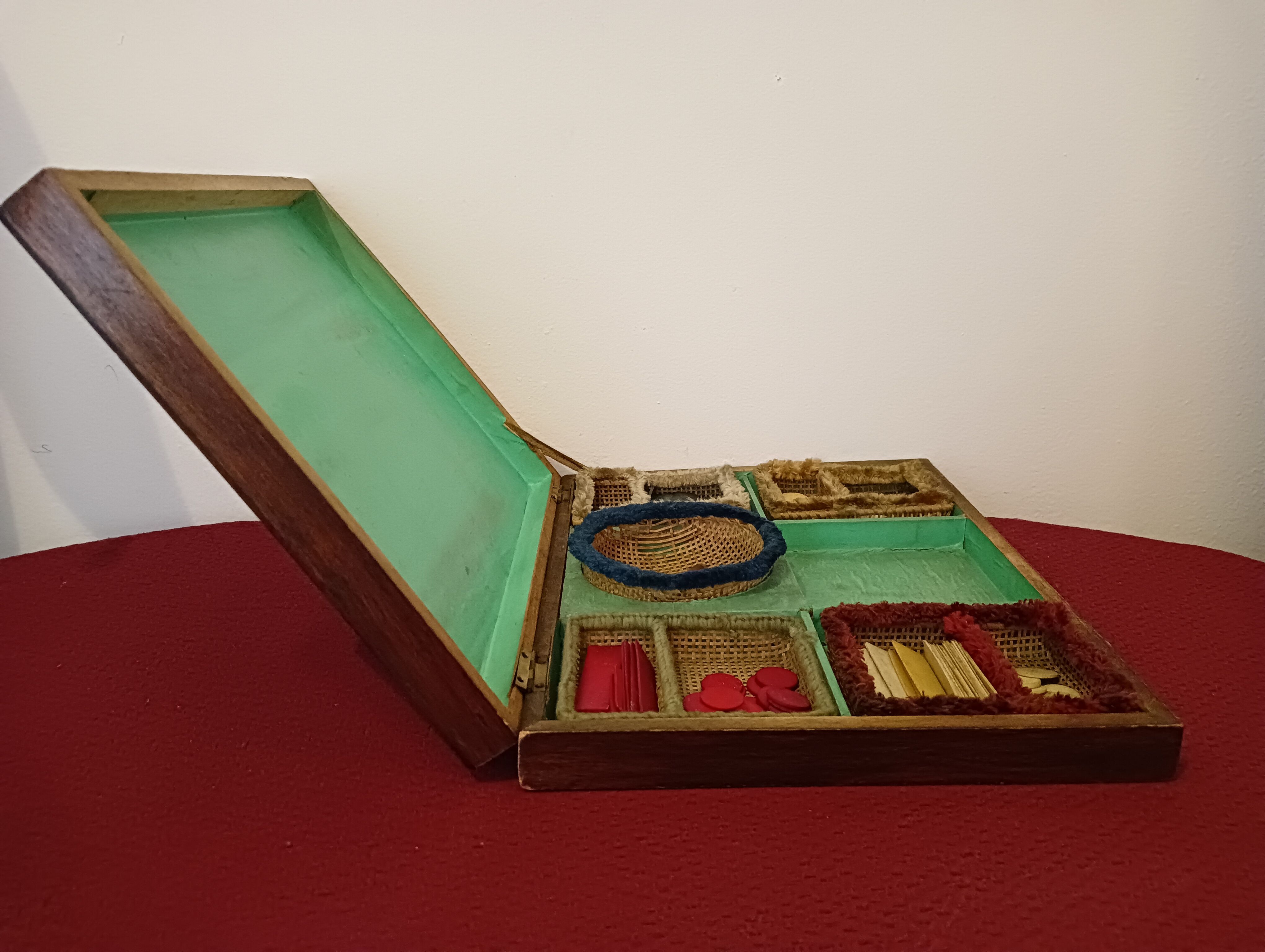 Old mahogany game box with bone tokens, XIXth century