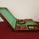 Old mahogany game box with bone tokens, XIXth century