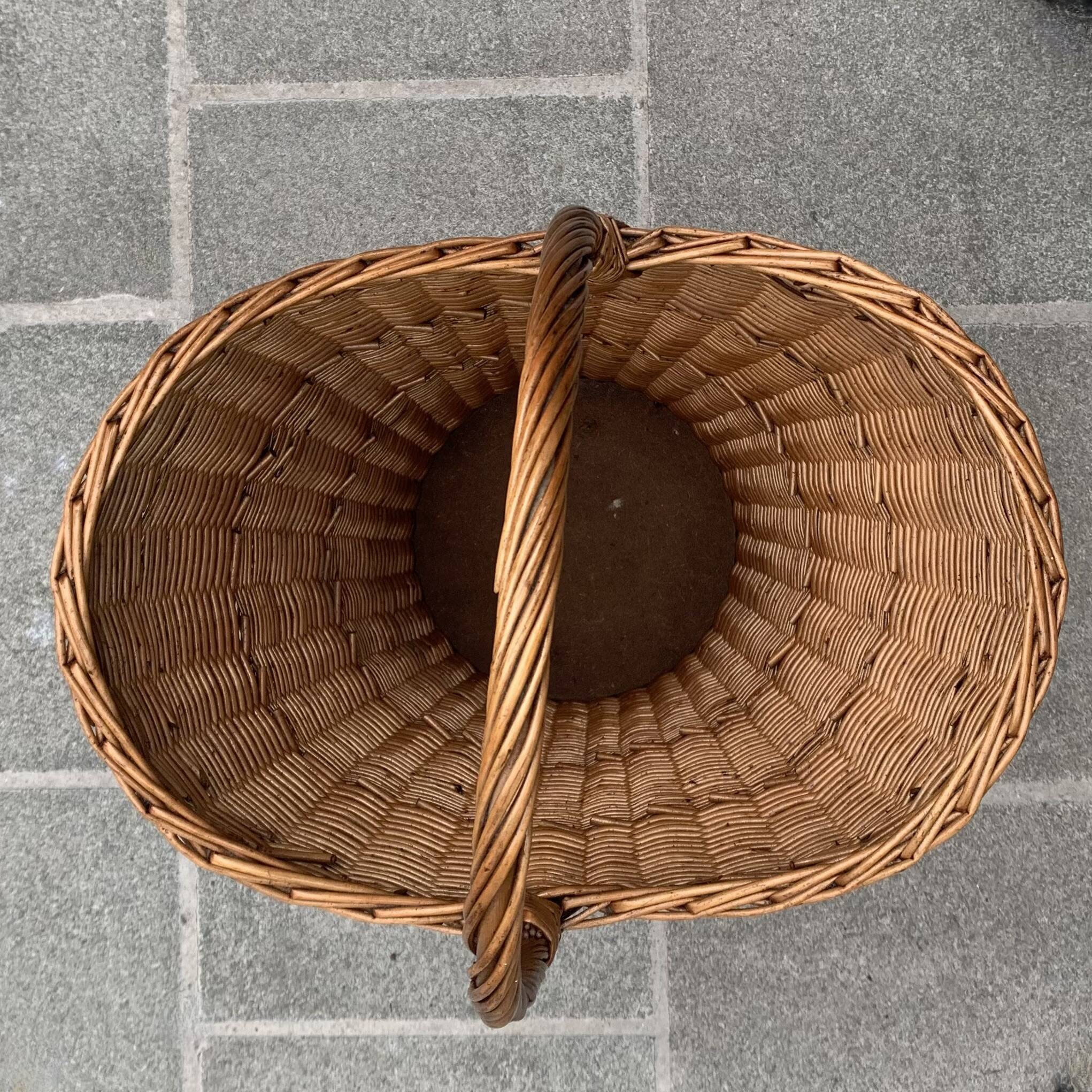 Old woven wicker umbrella stand