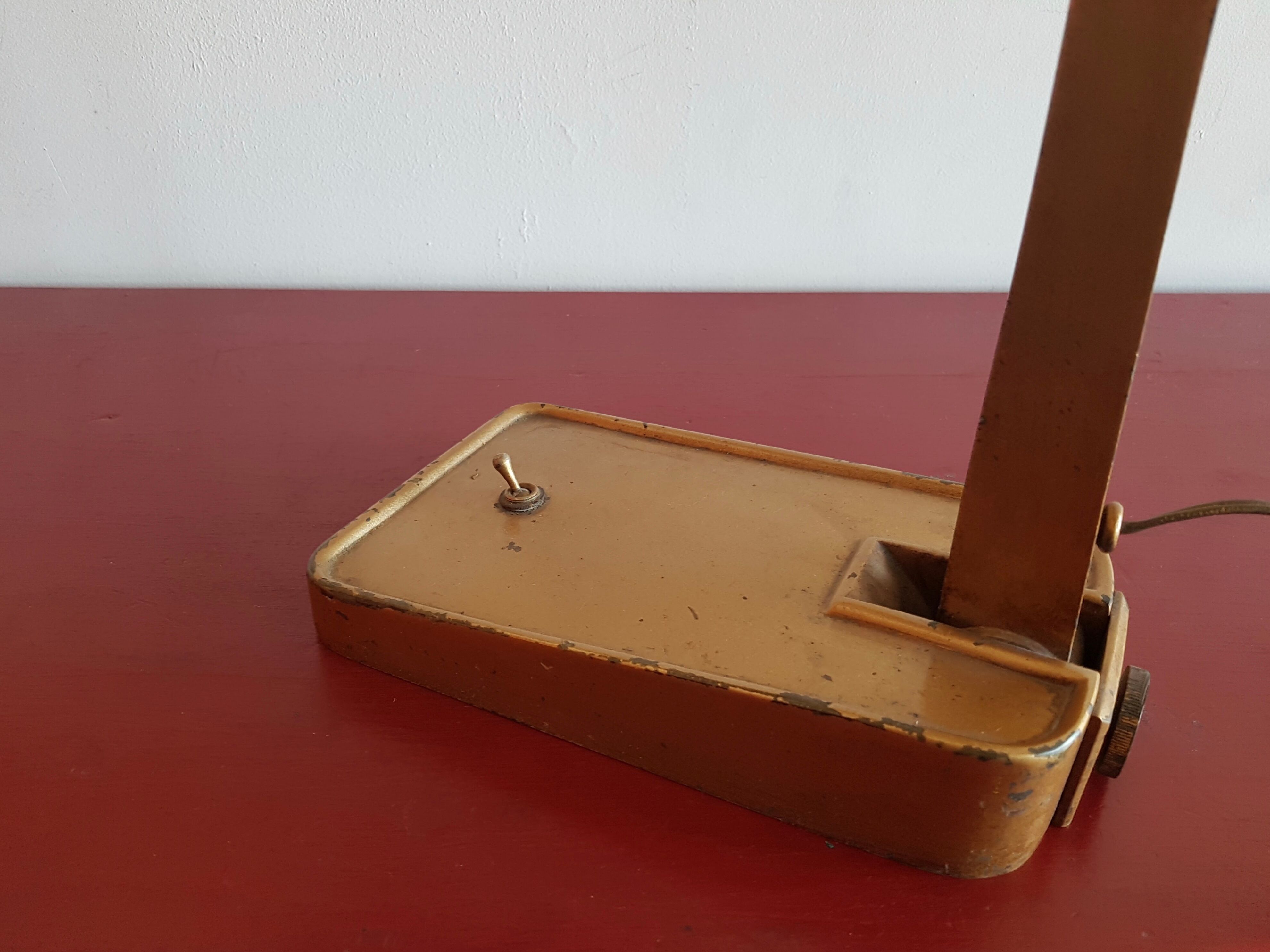 Gold painted metal table lamp