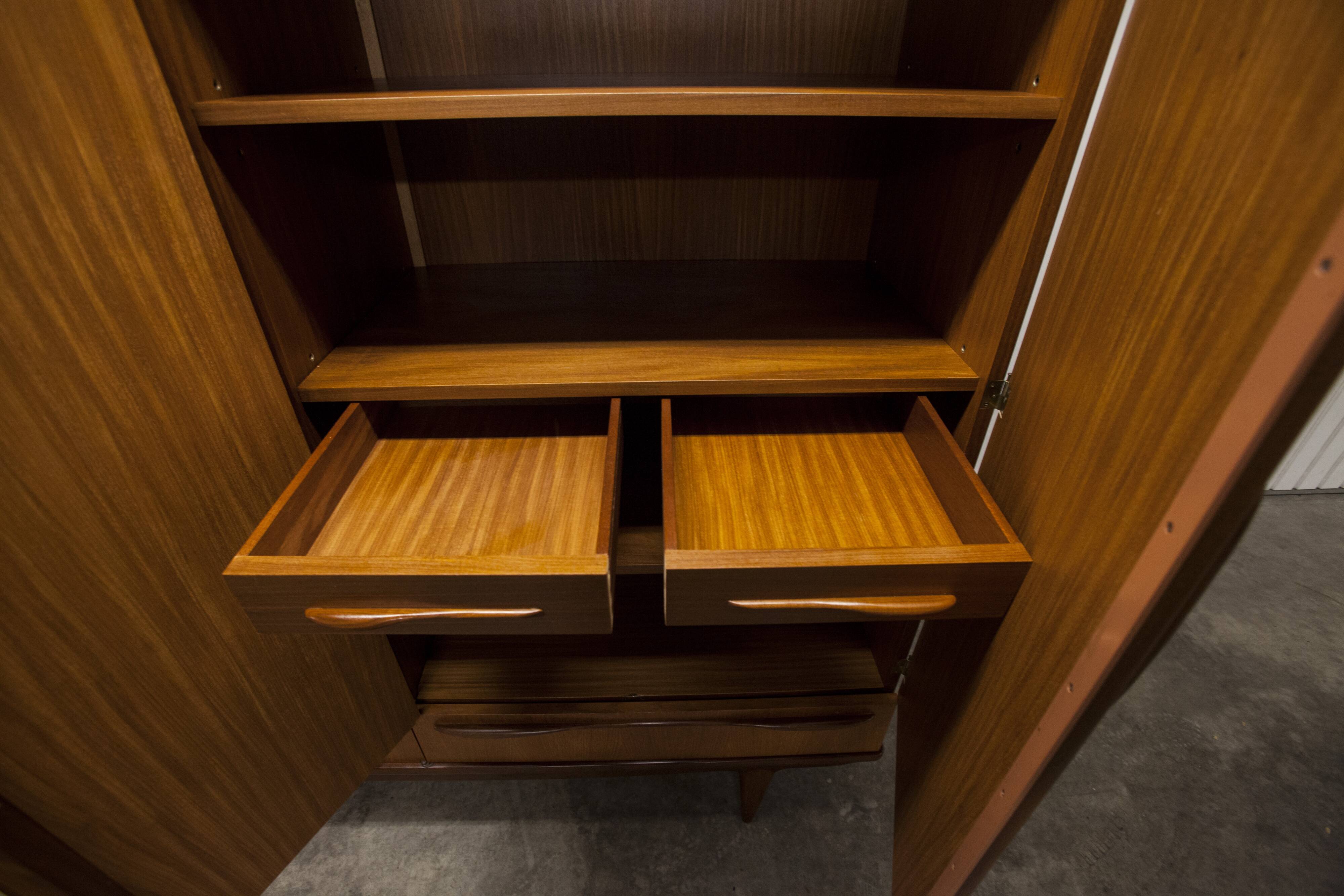 Scandinavian wardrobe 1960 teak 4 doors, 3 drawers, 2keys