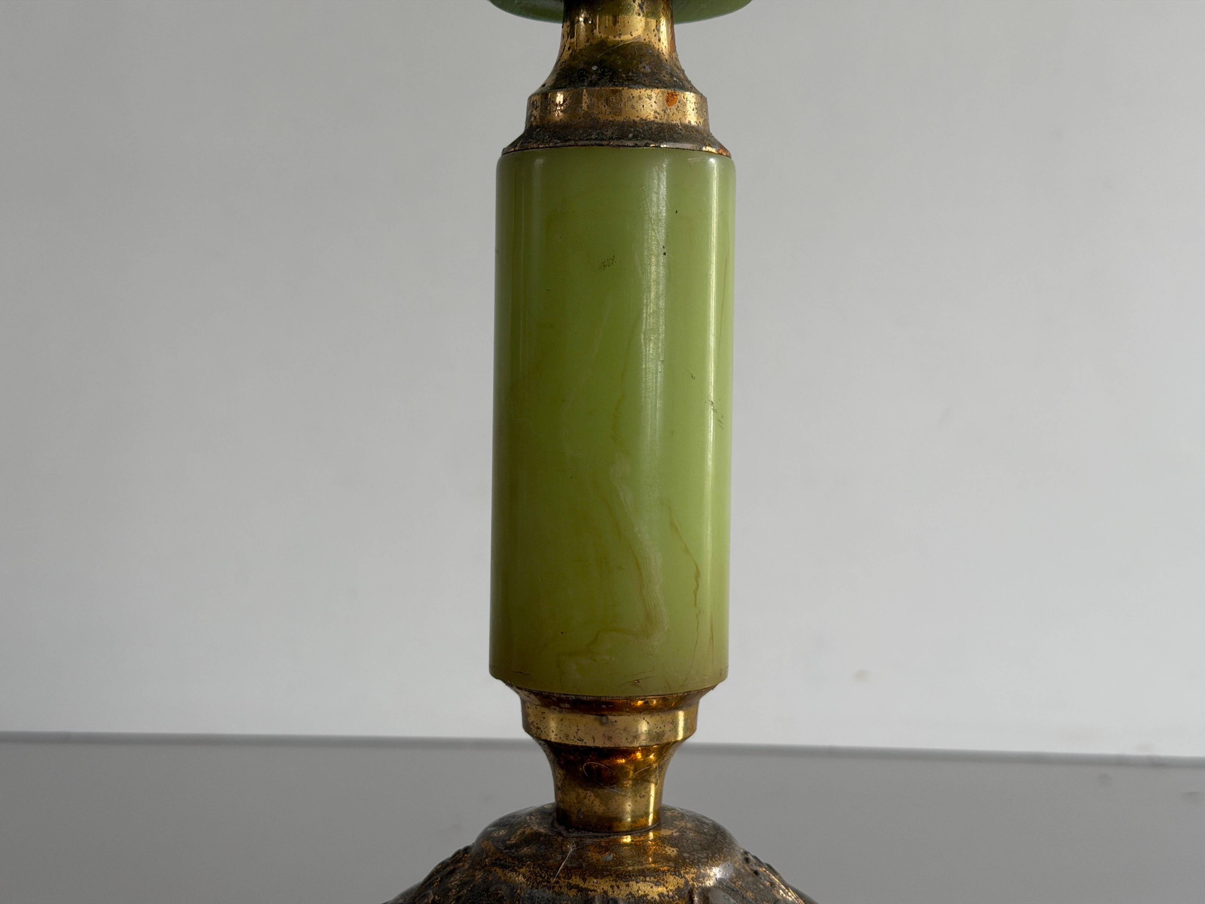 Mid-century side table in green marble with a brass base, 1960s, Italy.