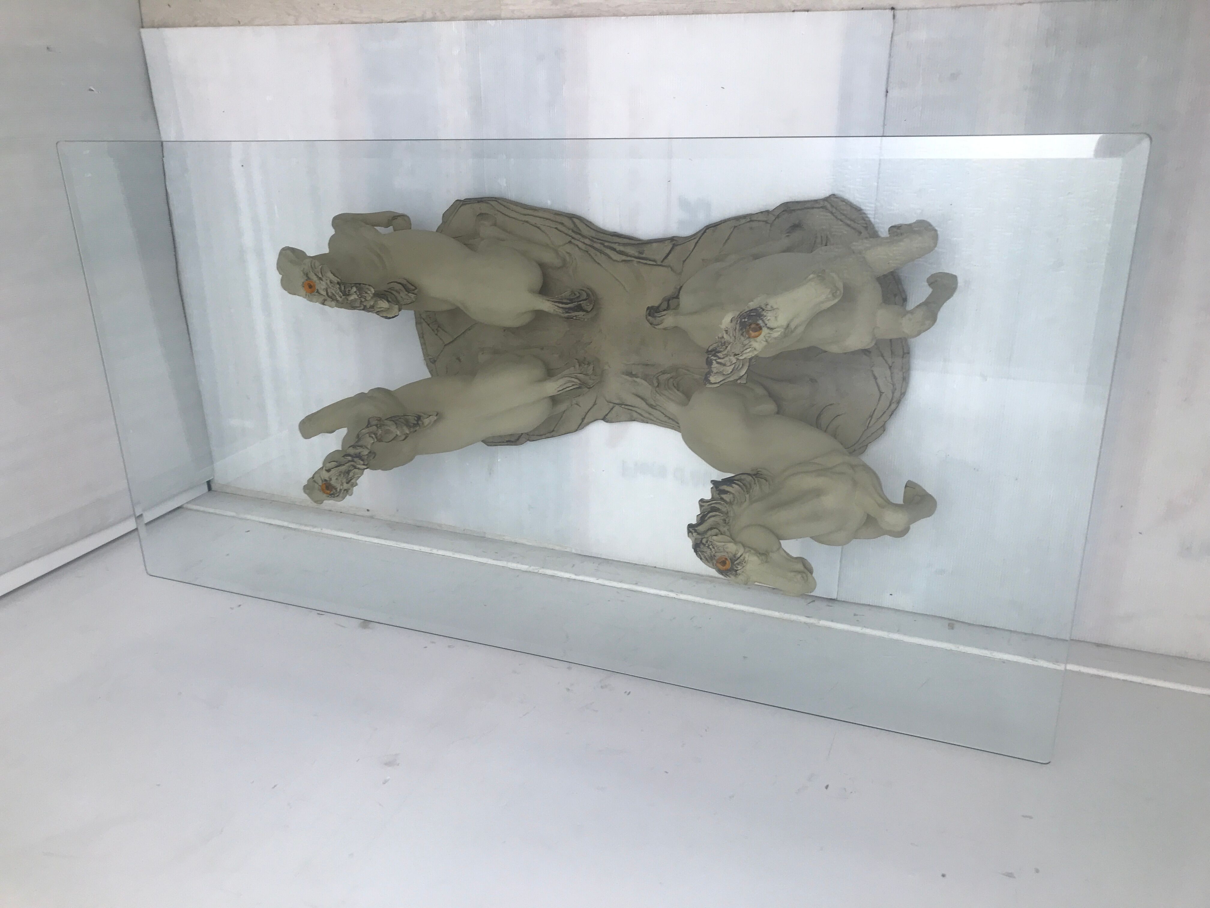 Coffee table glass top on 4 vintage horses