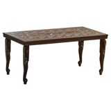 Vintage Indian teak coffee table inlaid with elephant motifs, mid-20th century.