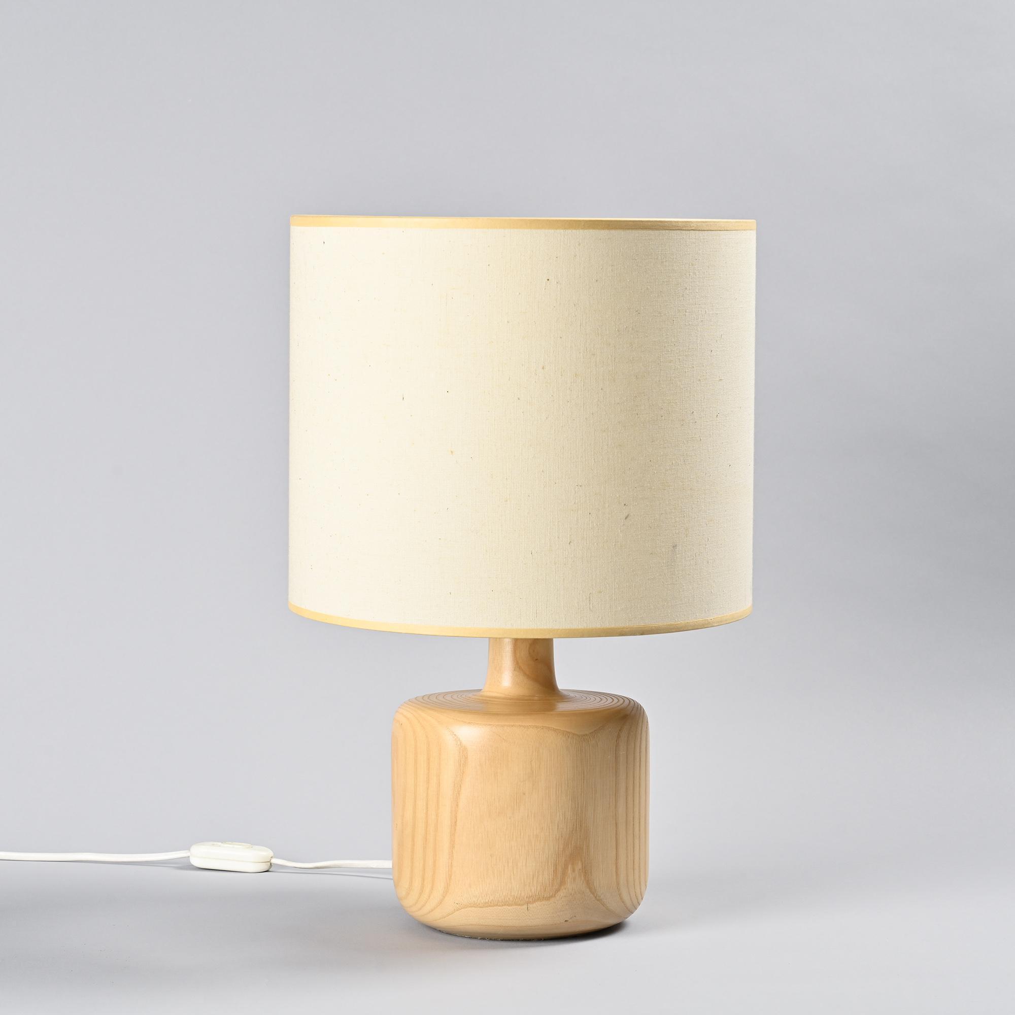 Table lamp in solid elm, France, circa 1970.