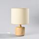 Table lamp in solid elm, France, circa 1970.