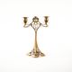 Art Nouveau brass candlestick with floral ornamentation, two arms, European