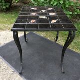 Vintage ceramic coffee table by Guy Trévoux with wrought iron base.