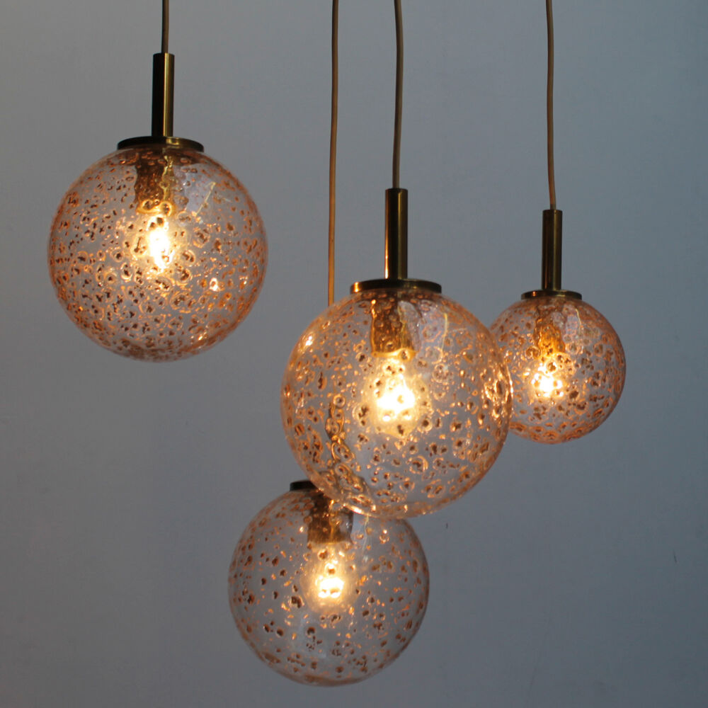 Four gold fleck globe pendants by Doria Germany