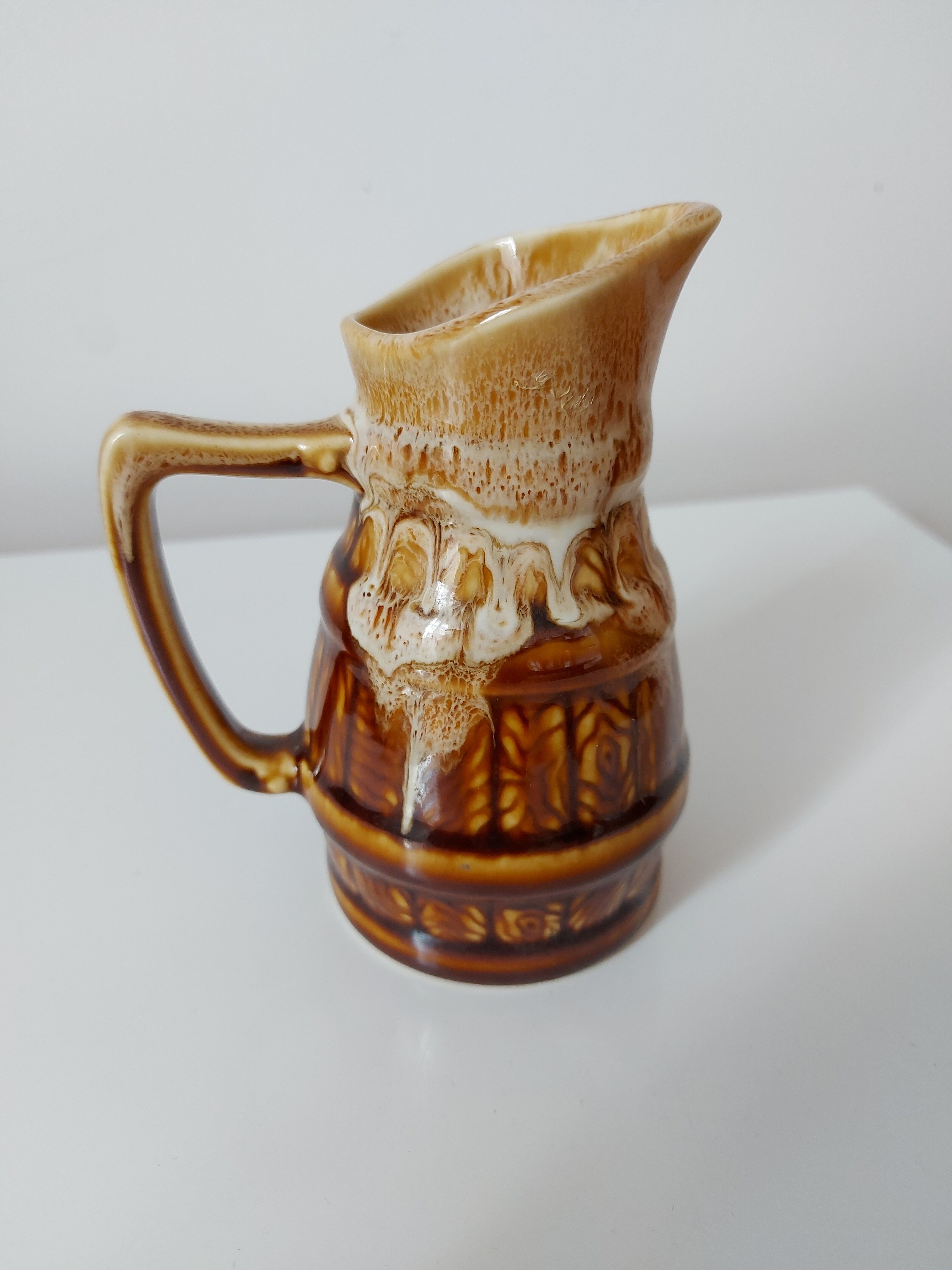 Vintage pitcher revol