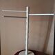 Bath towel rack in white wood, three bars.