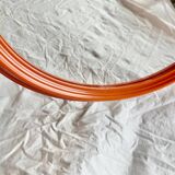 Vintage orange plastic oval wall mirror