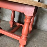 Round coffee table made of solid wood in orange color (soft color)