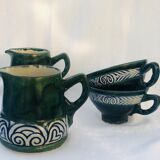 Two cups and two quimper milk jars