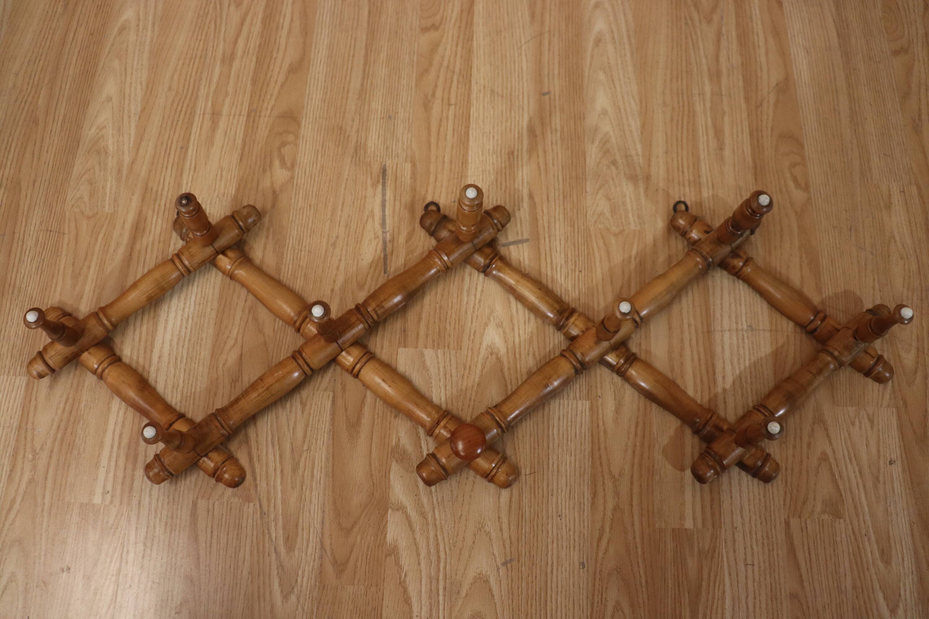 Old turned wooden wall coat rack