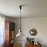 White metal suspension rises and falls