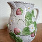 Barbotine pitcher with pastel flower decoration