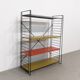 Vintage metal Tomado shelf to place