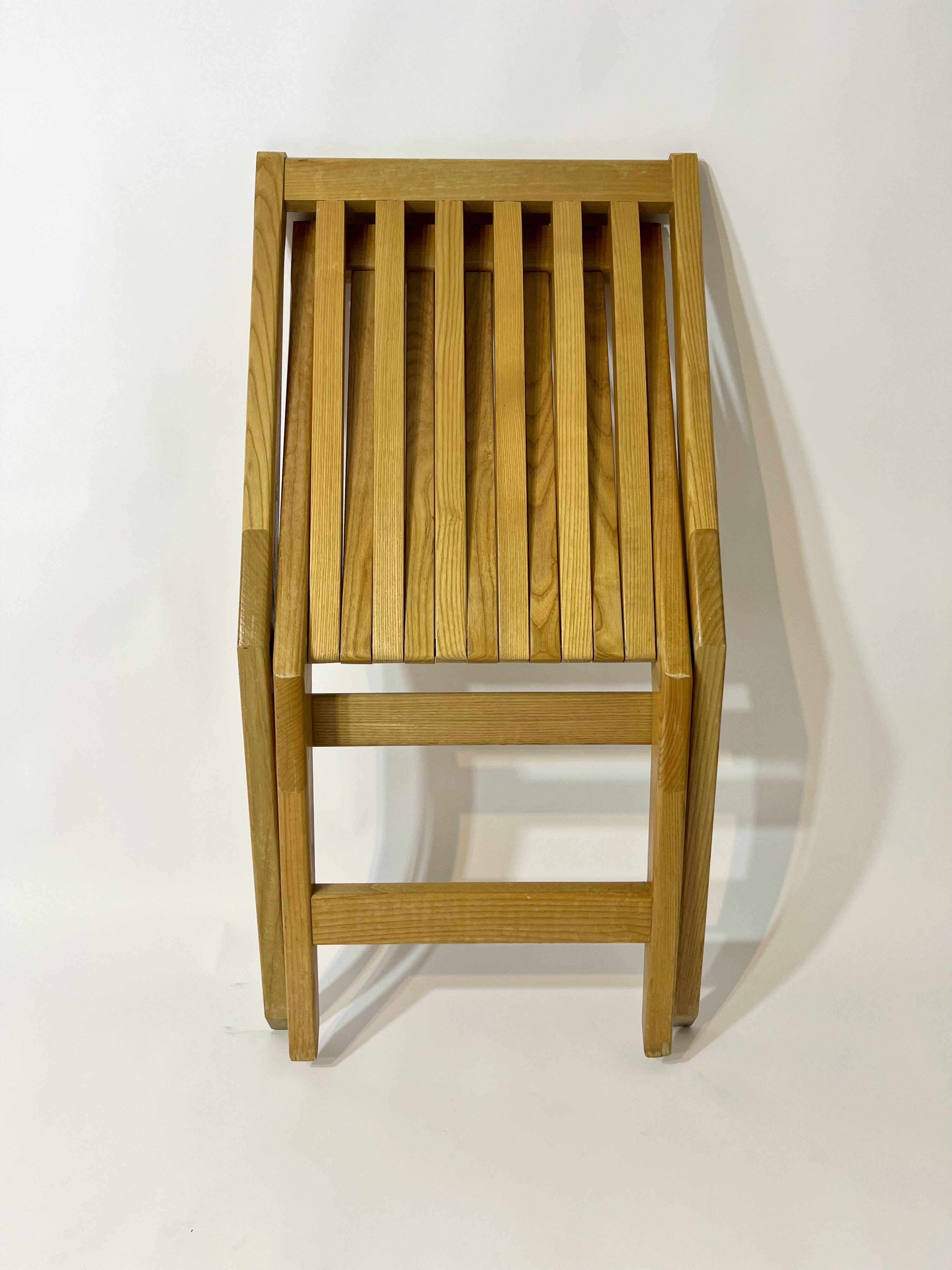 Vintage design solid wood scissor chairs from the 1970s