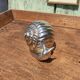 Vintage ashtray in silver and gold metal in the shape of a snail