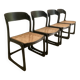 Set of 4 Baumann sled chairs with caning.