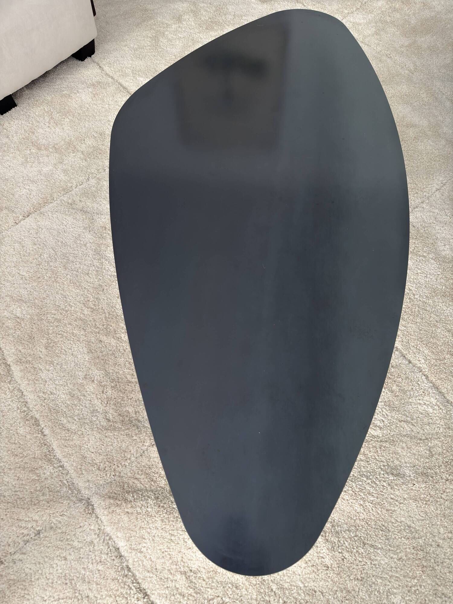 ATOLL table in raw black steel