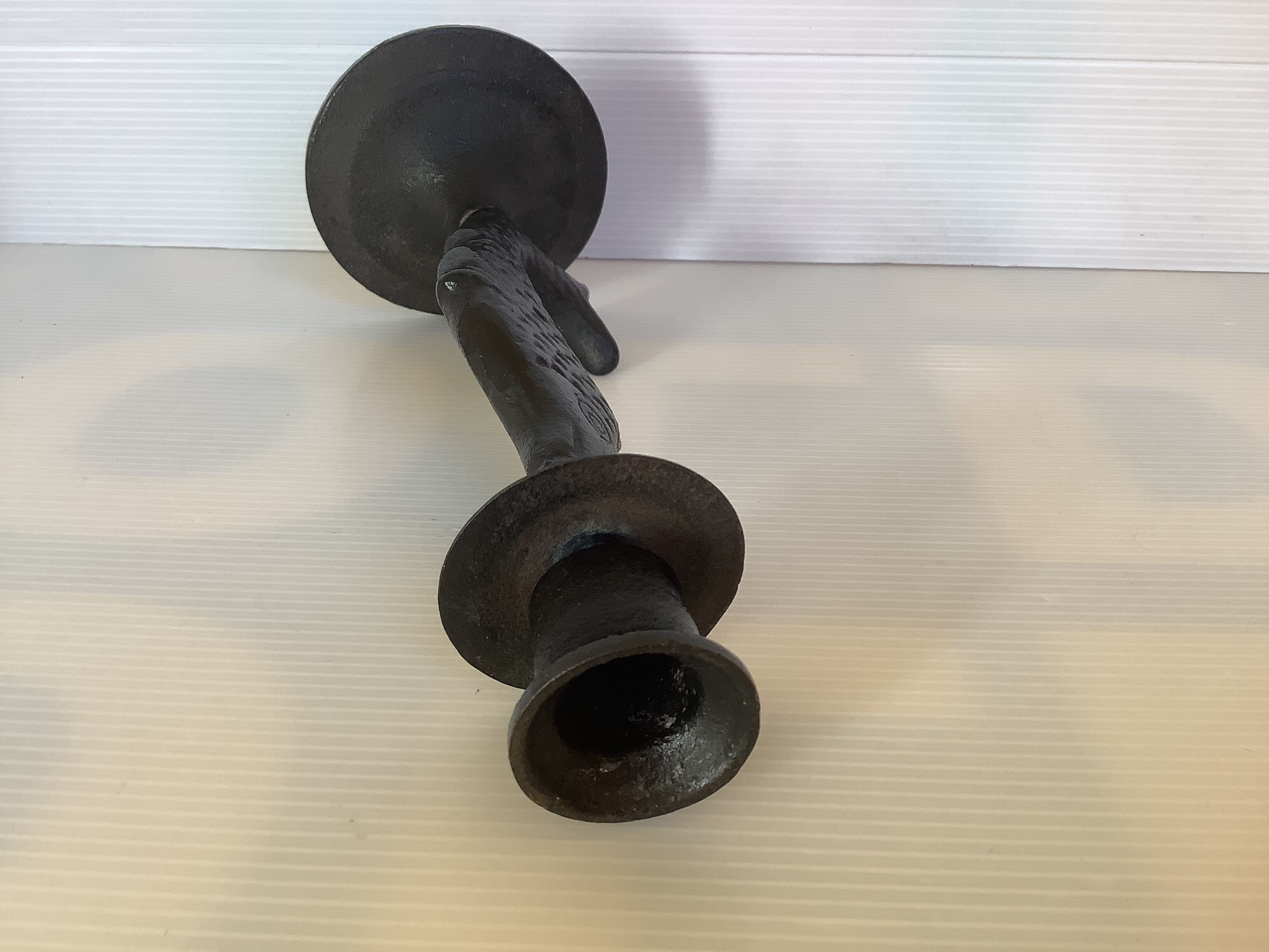 Brutalist black cast iron fish candle holder