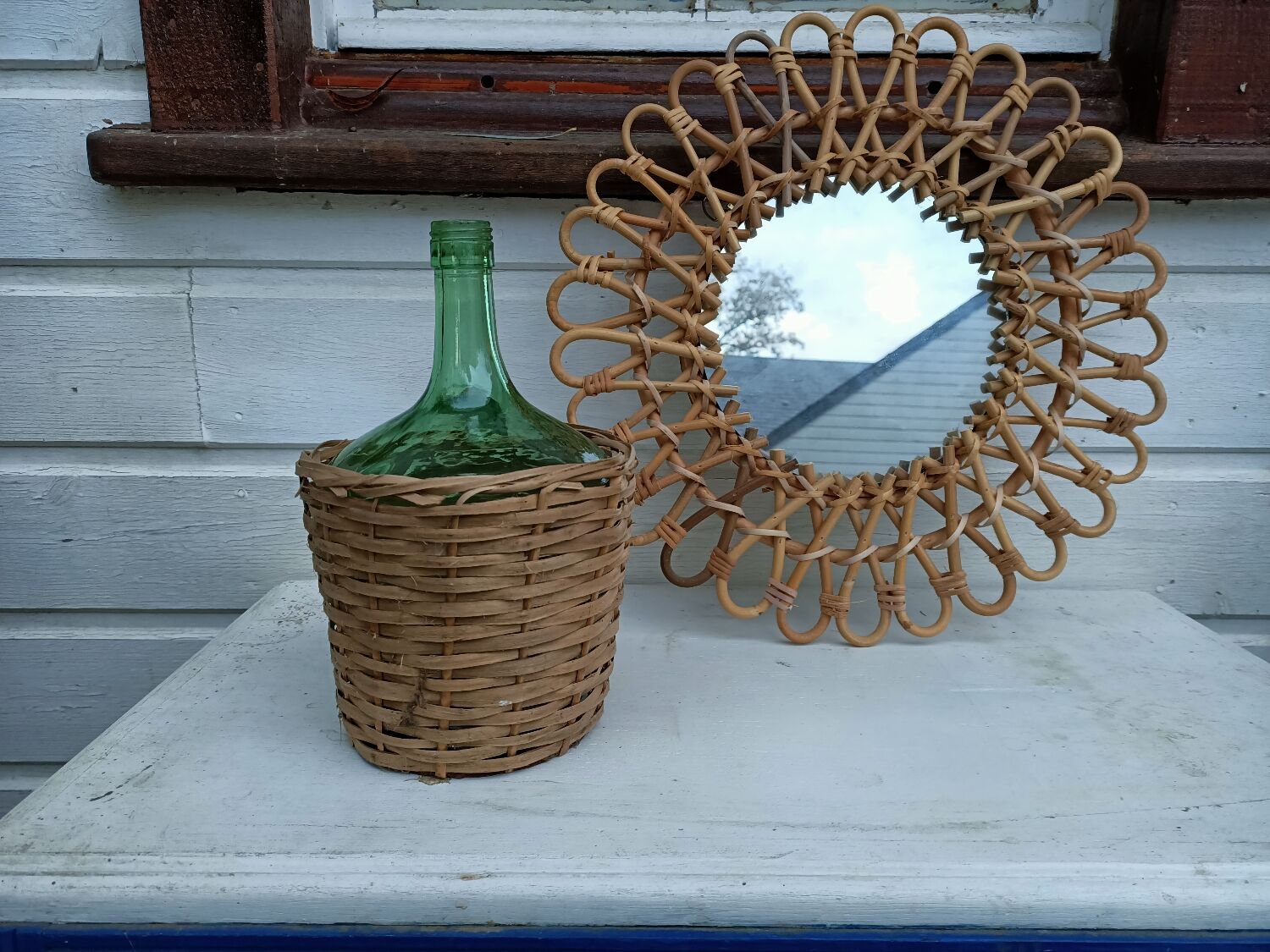Round rattan mirror