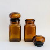 Pair of vintage amber glass jars