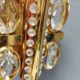 Swedish wall lamp in gold-colored metal with glass prisms. Estimated 1970-80s.