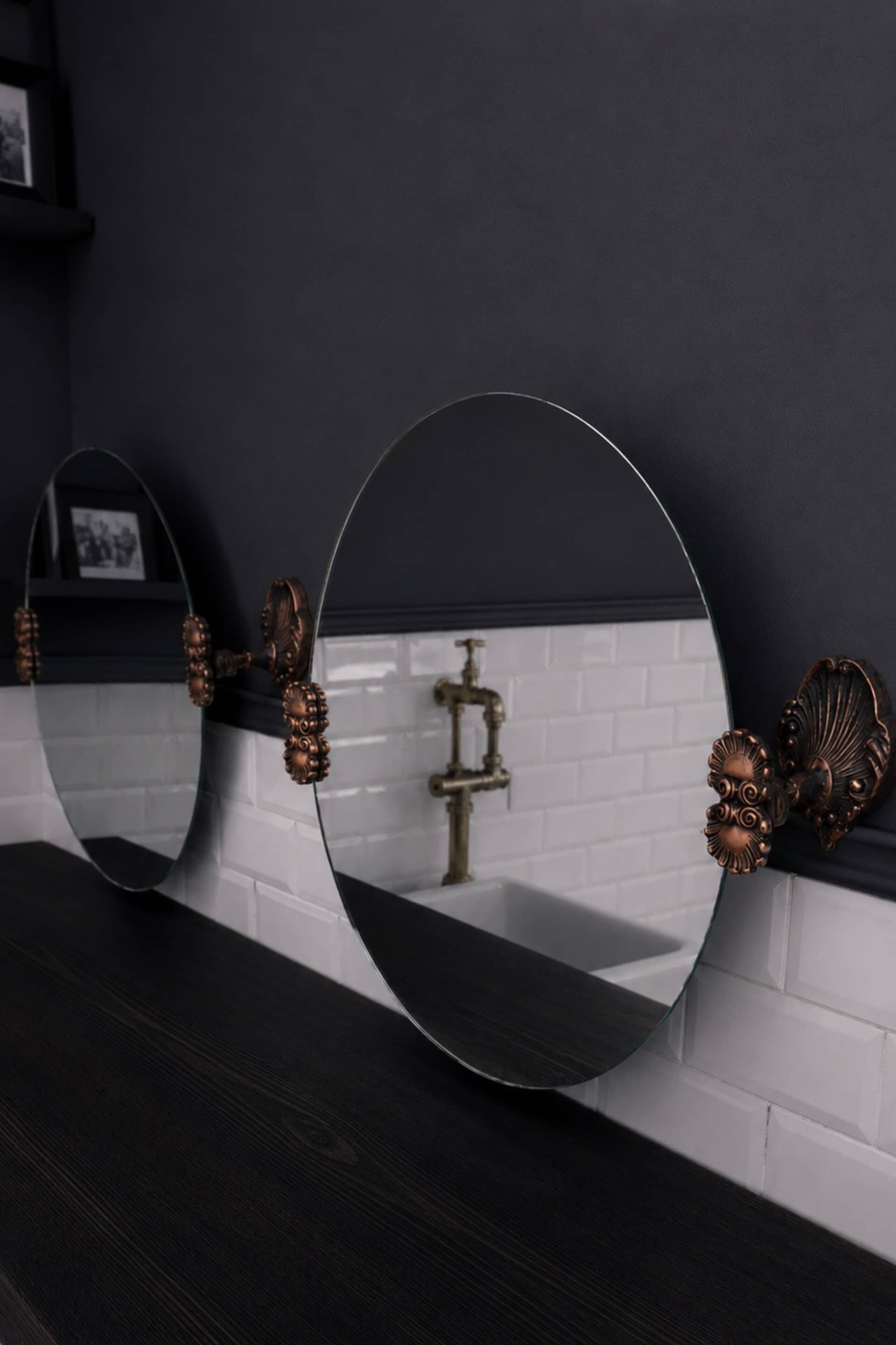 2 round mirrors made of copper alloy, 1940s-1950s