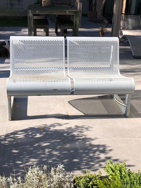Perforated metal garden bench