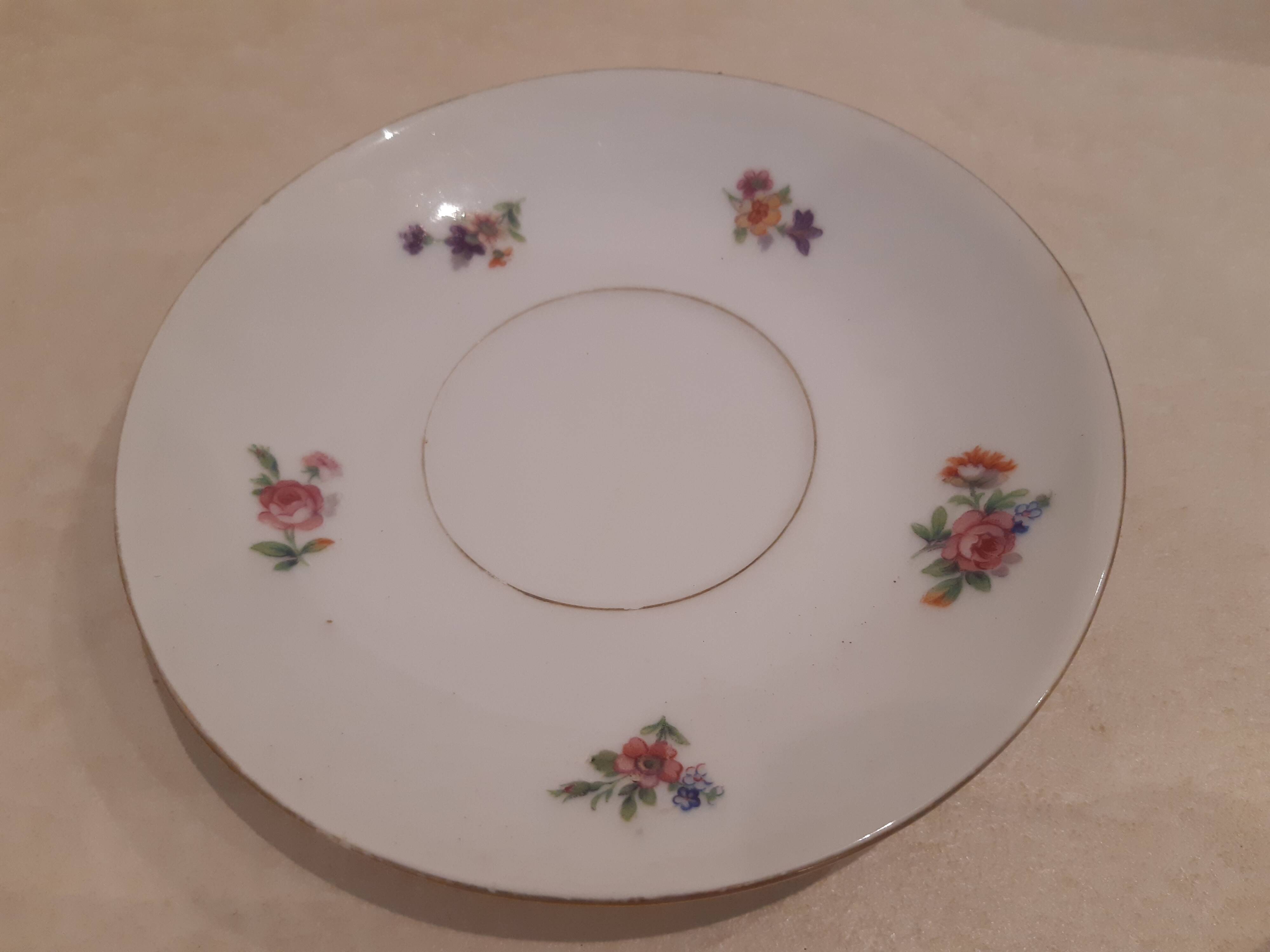 Breakfast set in white porcelain with floral decoration, 1930s.