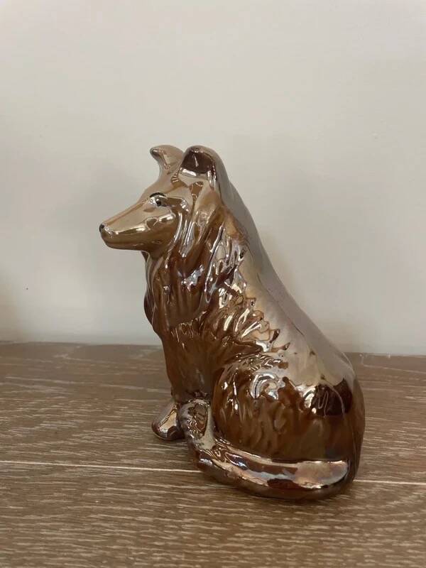Vintage brown handmade ceramic Collie dog figurine decoration.
